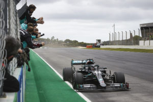Lewis Hamilton chequered flag in the Algarve